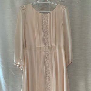 Light pink dress. Flowy with 3/4 length sleeve